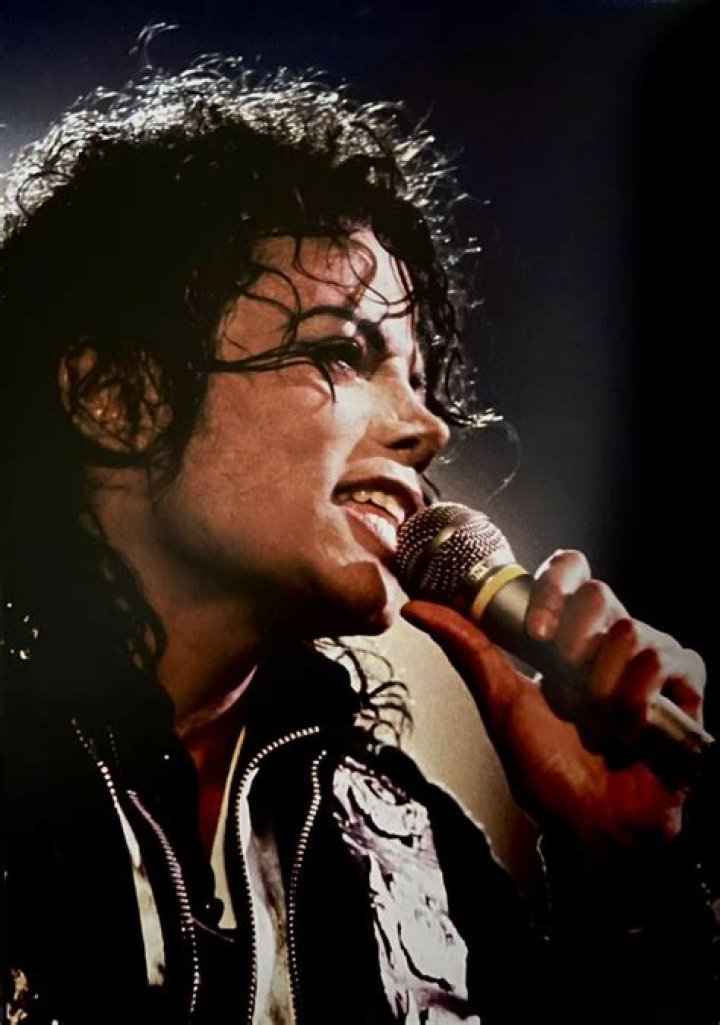 Michael Jackson singing in microphone